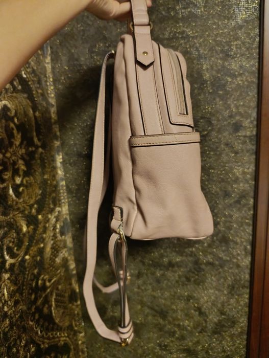 Розовая сумка с золотым замком