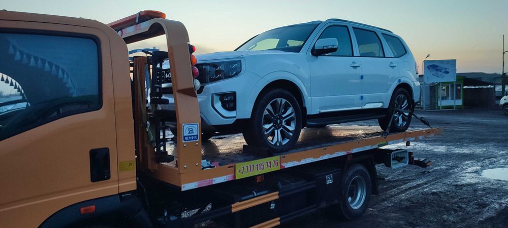 Услуга эвакуатора в Карой.