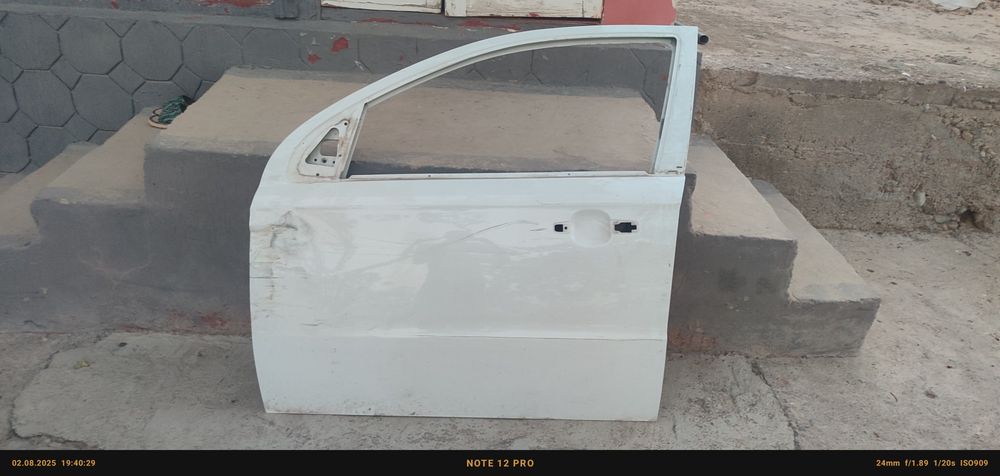 Nexia 3 eshik oldi radnoy