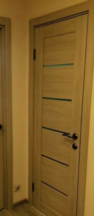 Установка межкомнатных дверей,