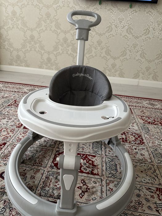 Продам детский ходунок в сером цвете как на фоте