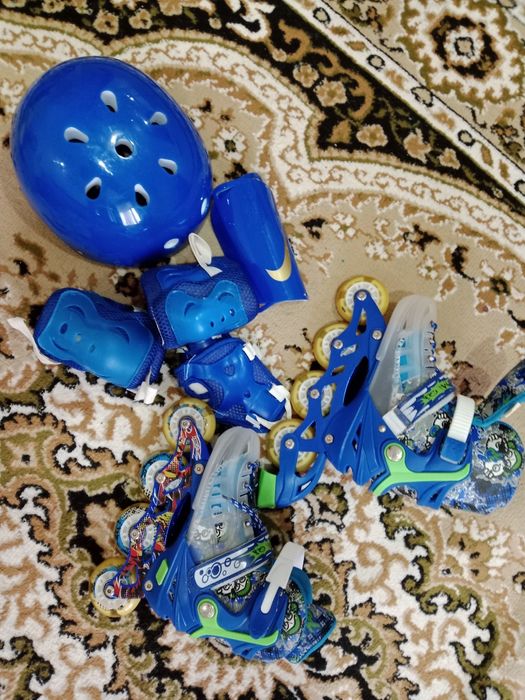 Полностью комплект ролики и амуниция к нему