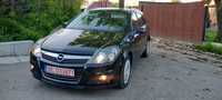 Astra H ,2009,Xenon,Pilot automat