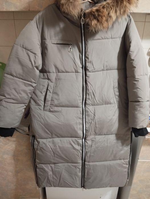 Пуховик зимний новый