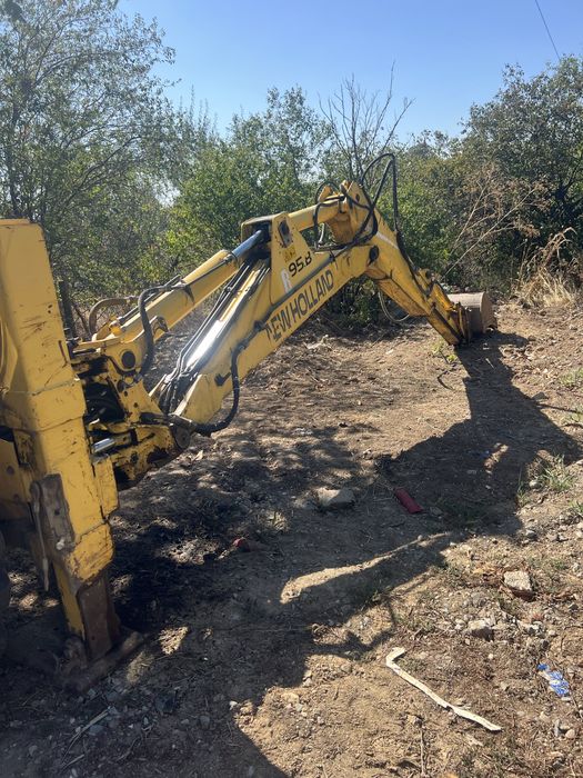 De vanzare buldoexcavator New Holland