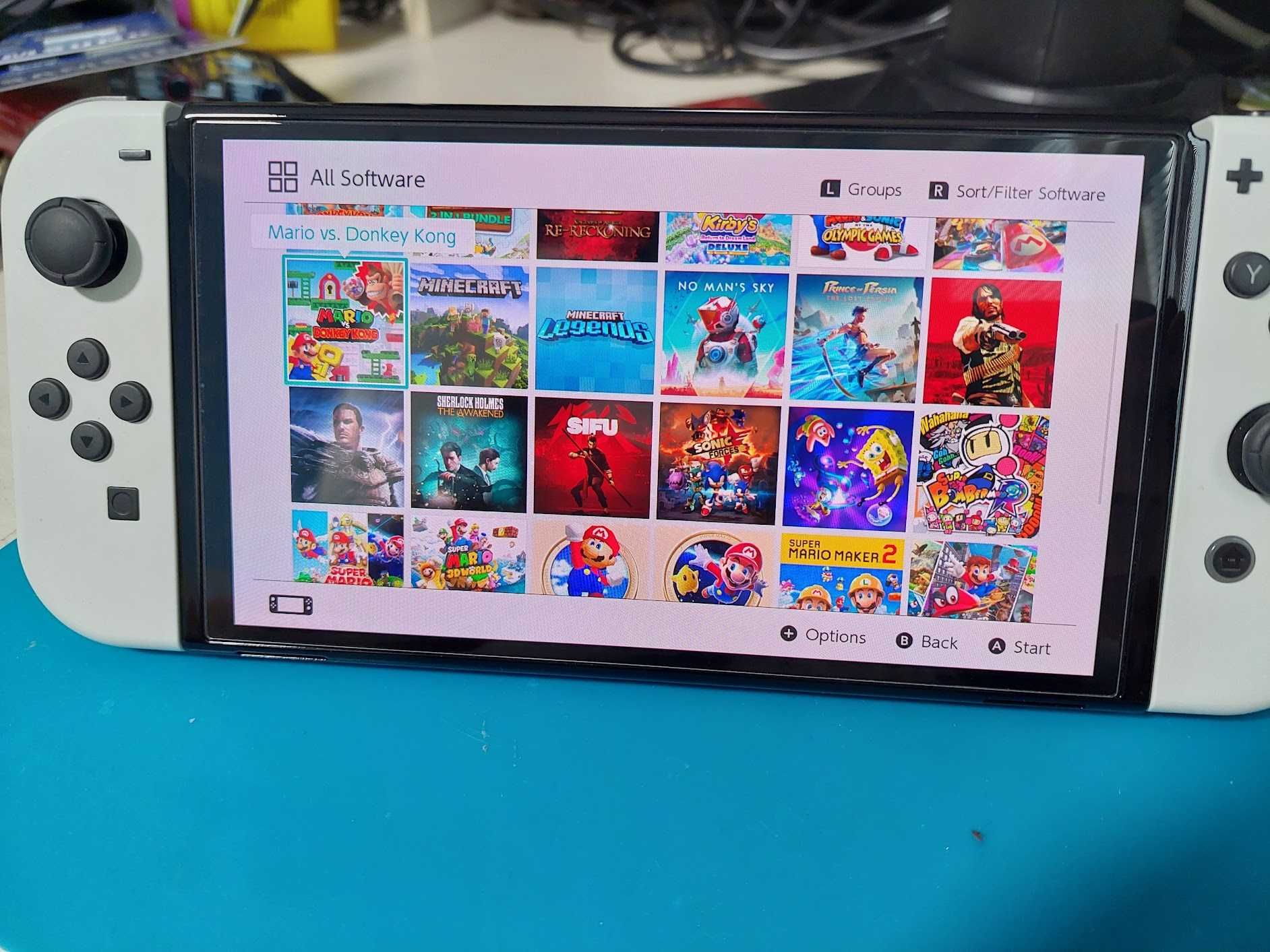 Nintendo Switch OLED - Хакнат с 512GB SD карта и качени 46 игри