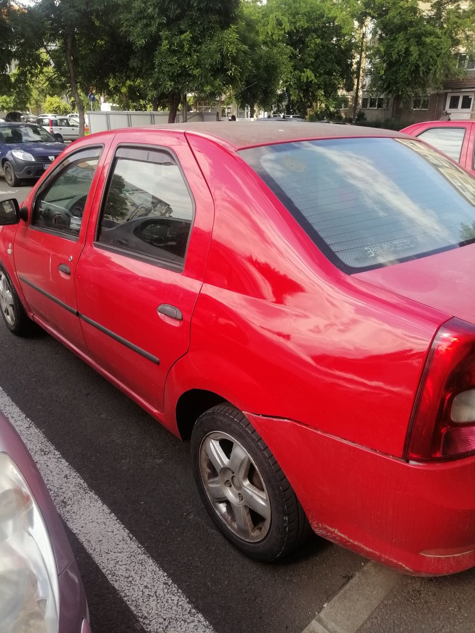 Vând Dacia Logan