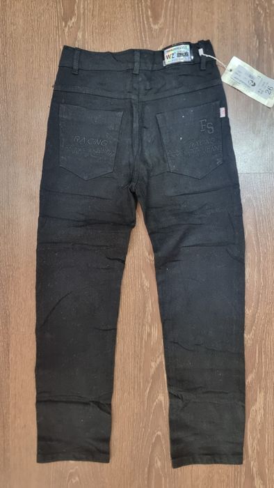 Брюки Новые с биркам 26 размер Длина 88 см