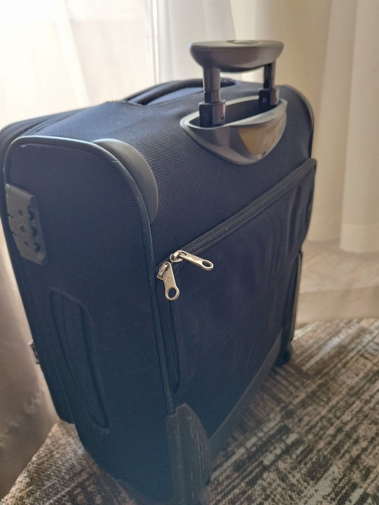Samsonite син куфар 55 см.