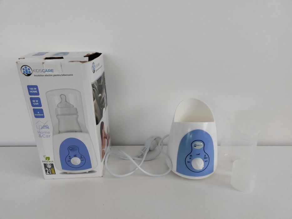Sterilizator Kids Care pt biberoane bebeluși  Are 4 functii