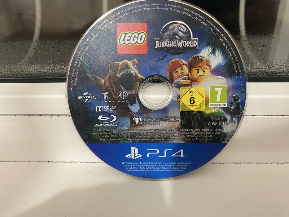 Диск Lego Jurassic World на PlayStation 4