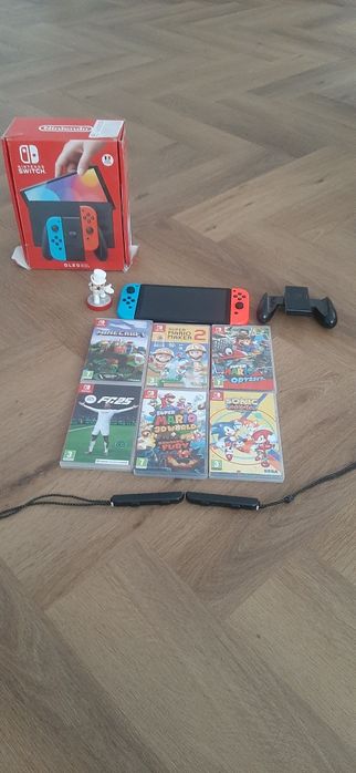 Nintendo switch oled + 7 jocuri