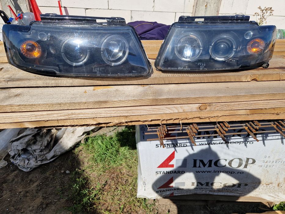 Vand faruri passat b5