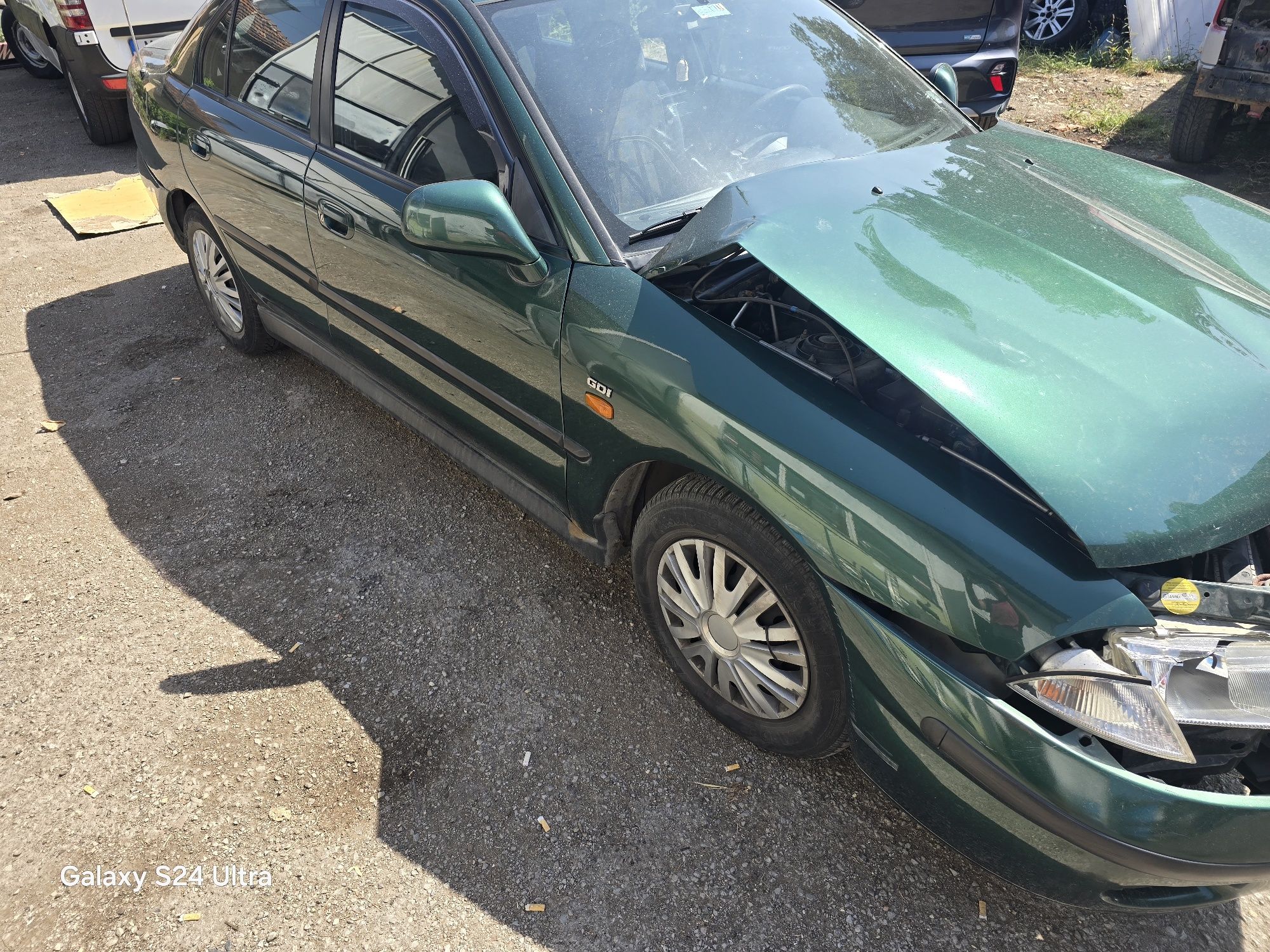 Mitsubishi Carisma GDI на части