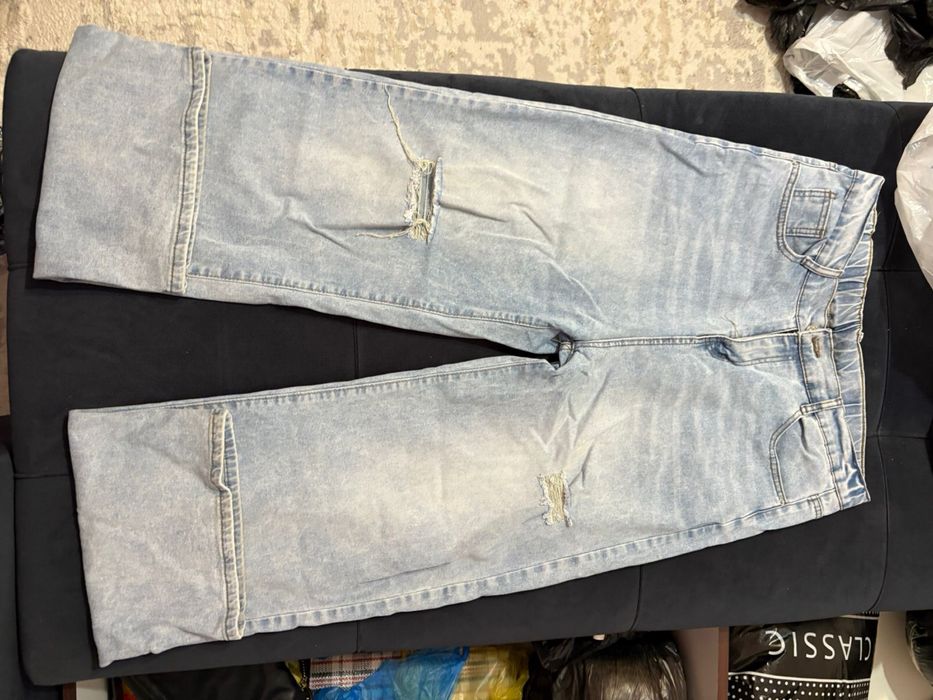 Джинсы почти новые