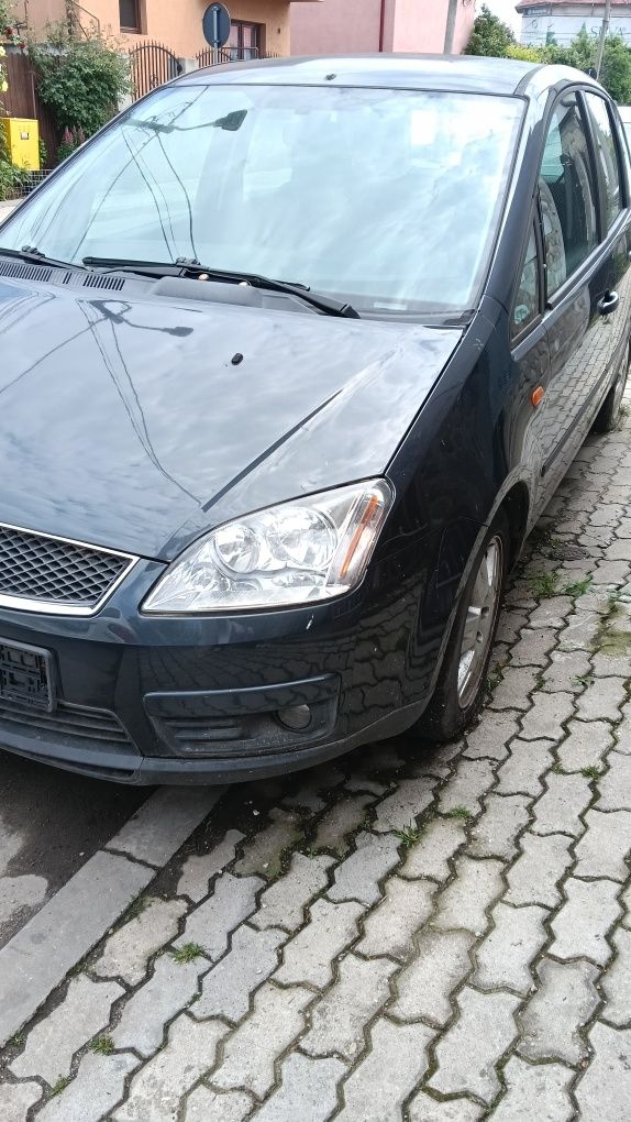 Dezmembrez Ford c MAX an 2006 motor 1.8 TDCi 
Mașina este întreagă
