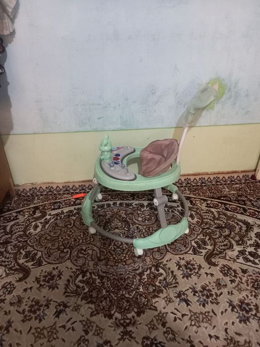 Детский ходунок новый