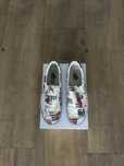 Vans Era beige red of the wall