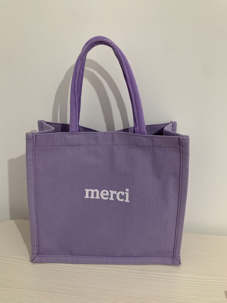 Модная фиолетовая сумка
