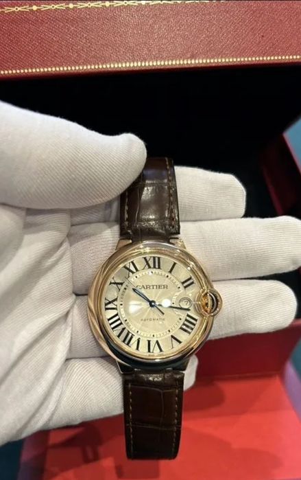 Швейцарские золотые Cartier Ballon bleu