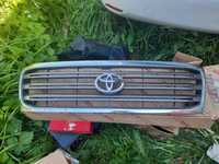 Решетка радиатора toyota land cruiser 100 ( genuine parts)