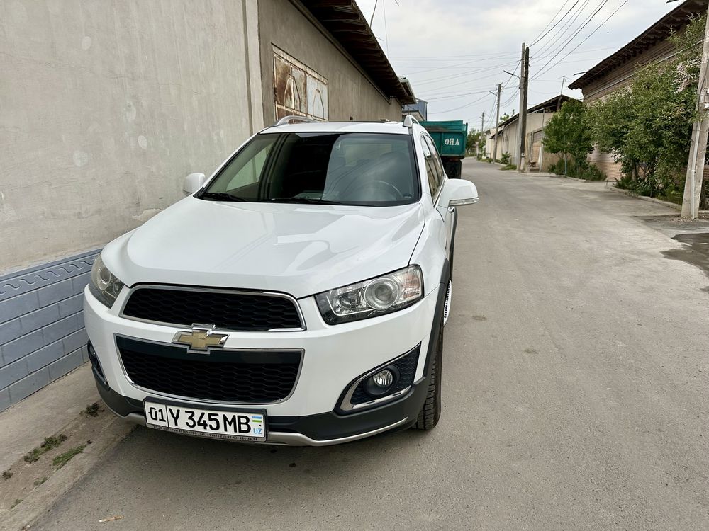 Продам  автомобиль Captiva 3+ Белого цвета