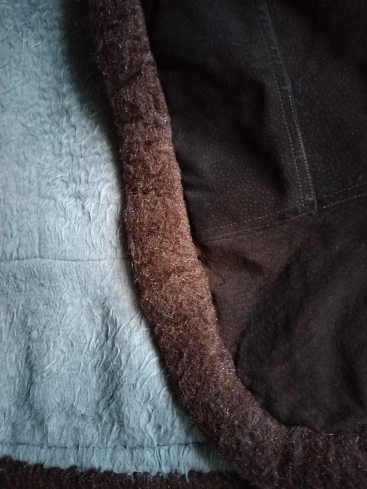 Дамски кожен елек от едно време