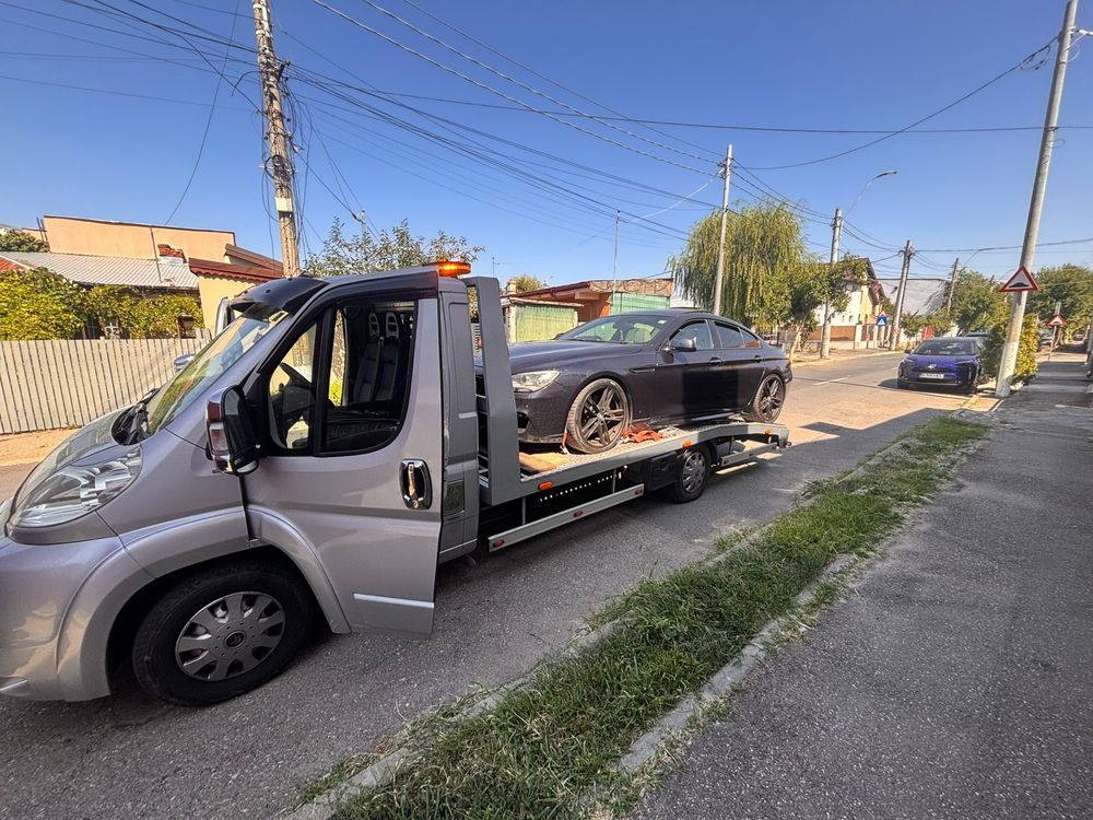 Tractari auto  / Platforma auto /Asistenta rutiera bucuresti/ in tara