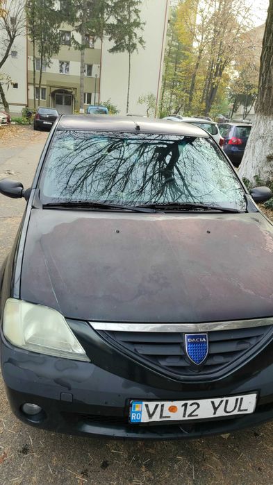 Vând logan verde cameleon