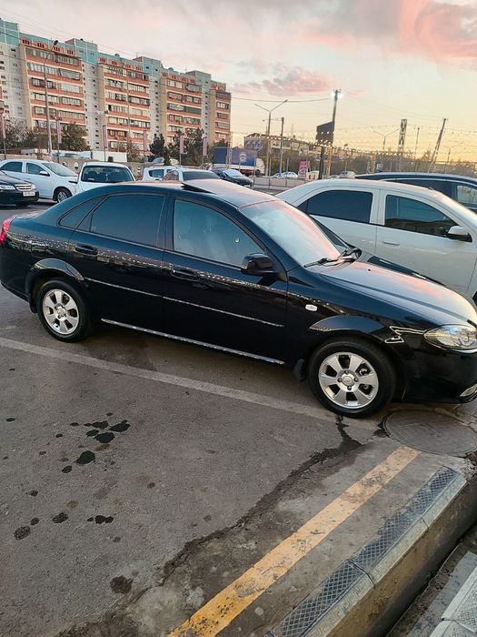 Lacetti gentra sotiladi 2021 yil Tesla manitor 4 eshik sh