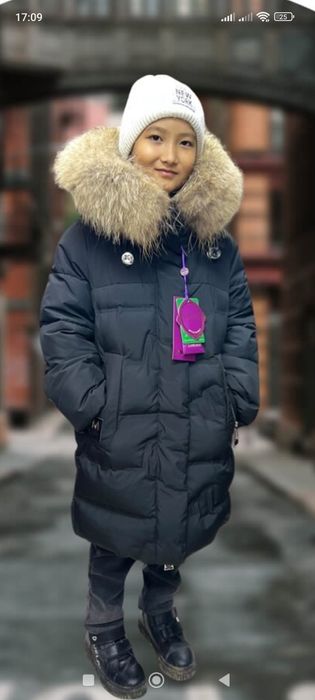 Продам зимний пуховик на девочку 10 лет