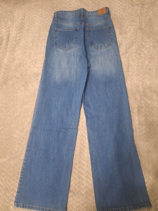 Джинсы клёш широкие S