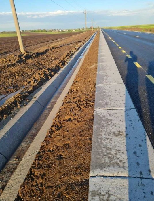 Santuri si rigole betonate  rigole de acostament realizate mecanizat