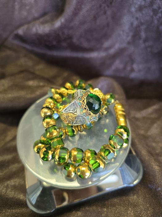 Сребърен мъжки пръстен и броеница с позлатени елементи