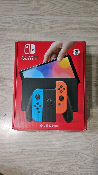 Nintendo Switch OLED + Ring Fit Adventure