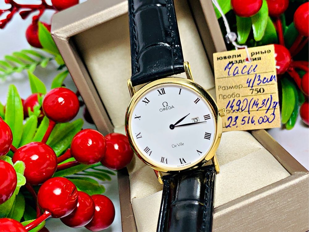 Золотые часы от бренда класса люкс «Omega»