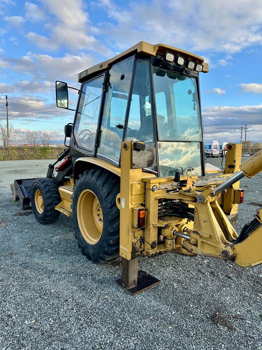 Buldoexcavator Cat 428D / An 2005 / 2 cupe