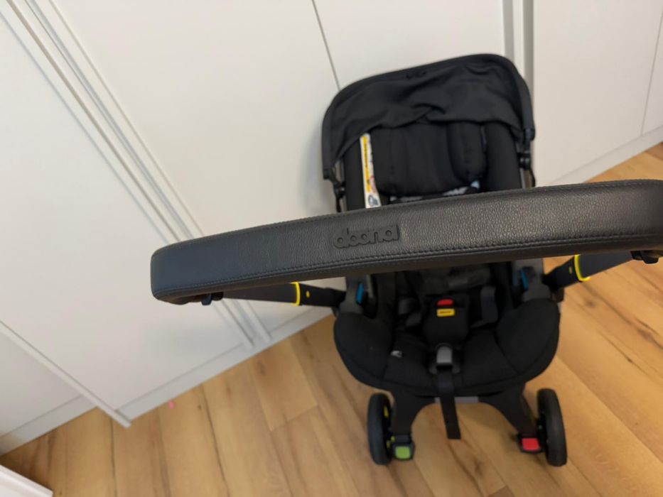 Scoica auto Doona i i-Size black transformabila in carucior