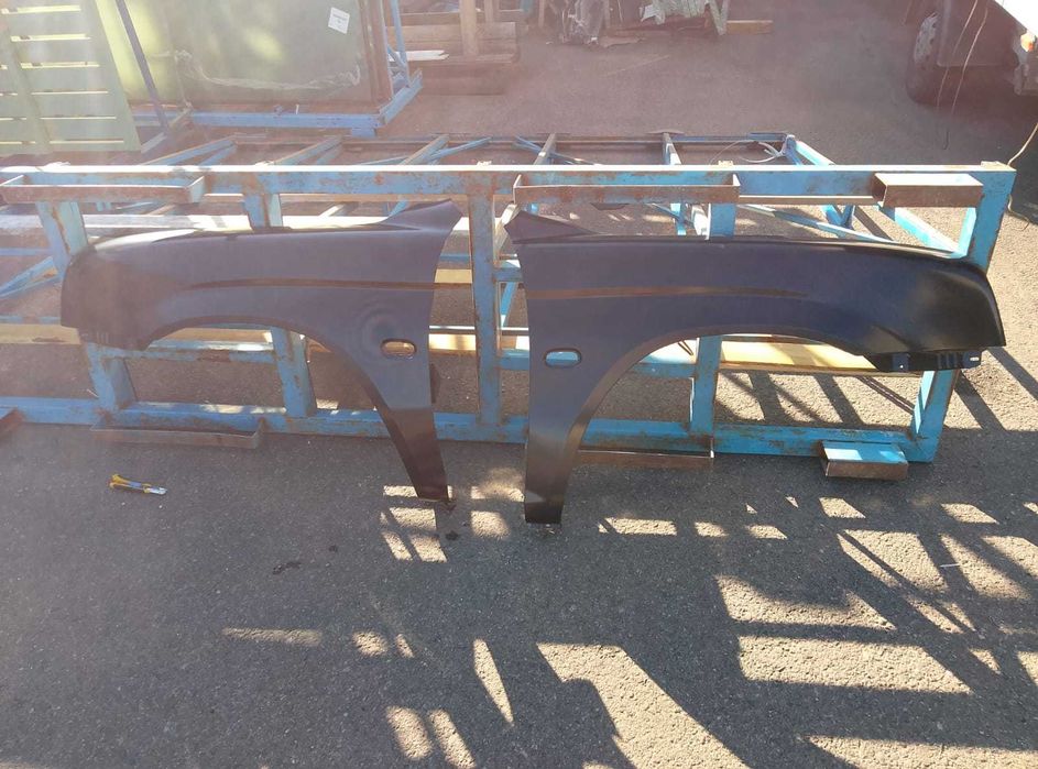 Aripa l 200 l2oo mitsubishi  hayon spate stanga sau dreapta piese l200