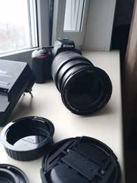 Nikon D5600 с объективом 18-140 мм (есть пример фотографии)