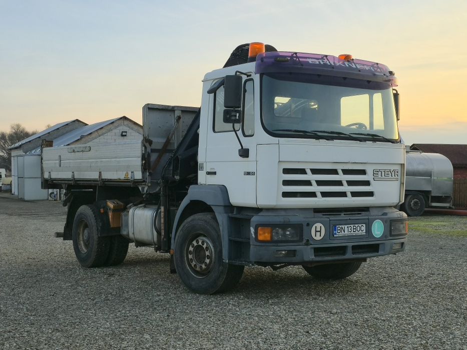 Camion 4x2 MAN Steyr 4x2 basculabil cu macara HIAB 102