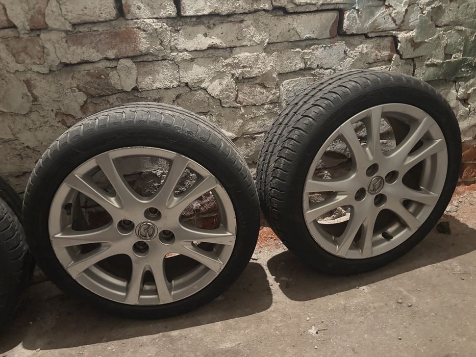 Продавам джанти с гуми за MAZDA 2