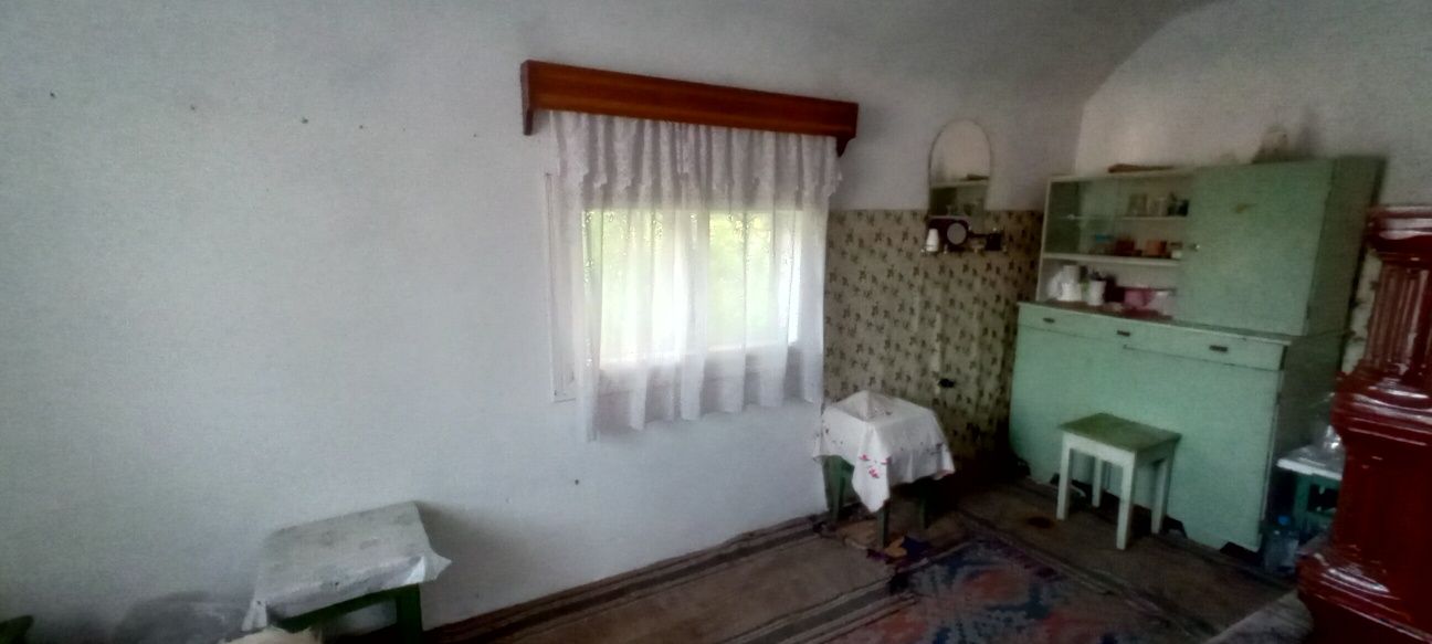 Teren in Malini cu casa bătrânească