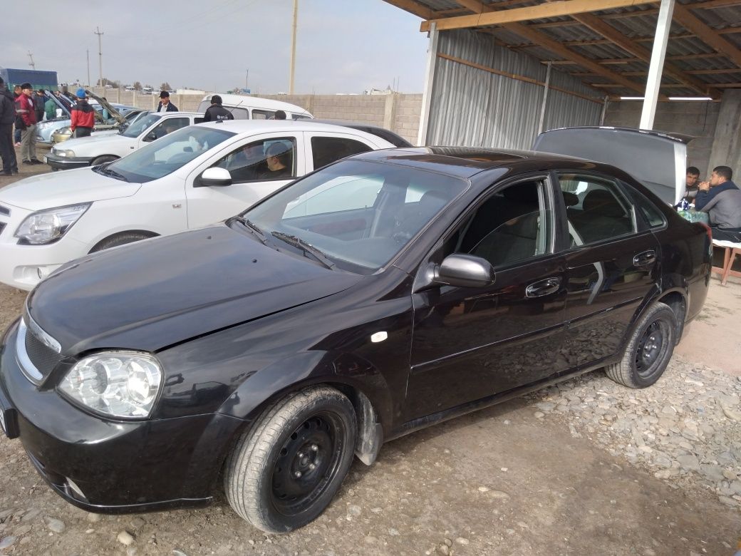 Lacetti 2011 avtomat motor 1.8 qora sotiladi