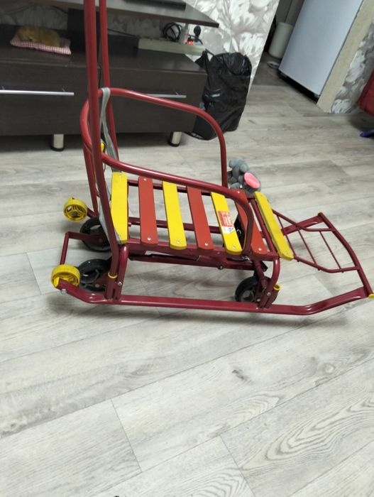 Продам санки коляску .