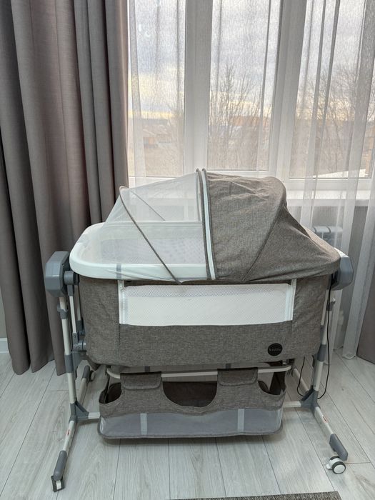 Манеж-кровать Kidilo поперечный маятниковый механизм