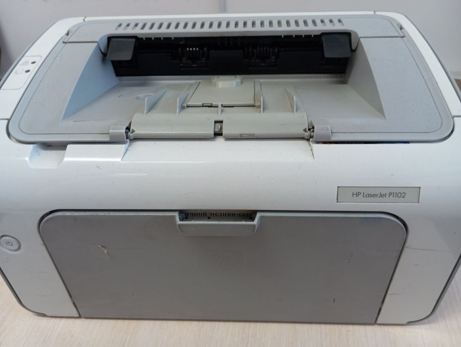 Принтер HP p1102