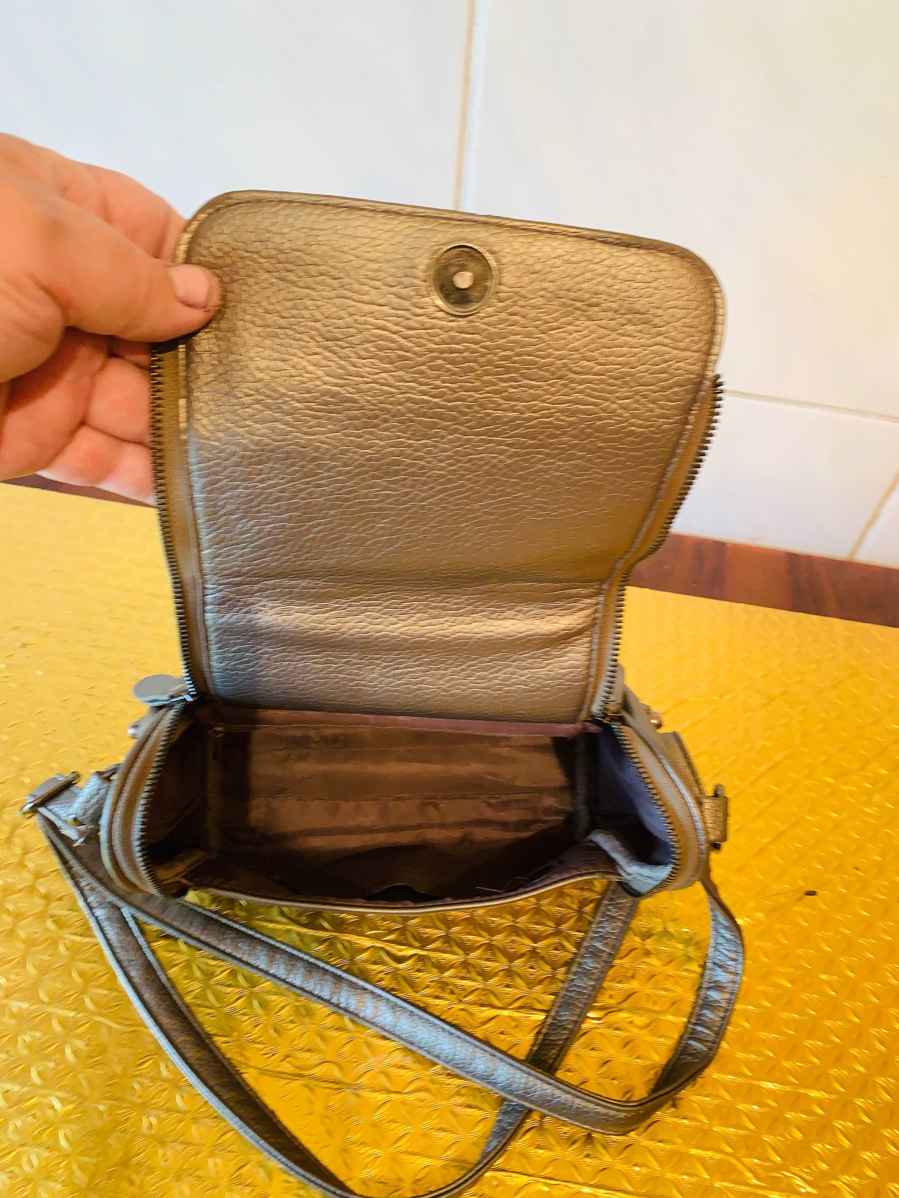 Продам сумочки дам. из натур. кожи серебр. цвета (сделано в Германии)
