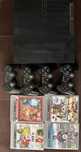 Playstation 3 Slim - 320GB  + 4 джойстика + 4 игри