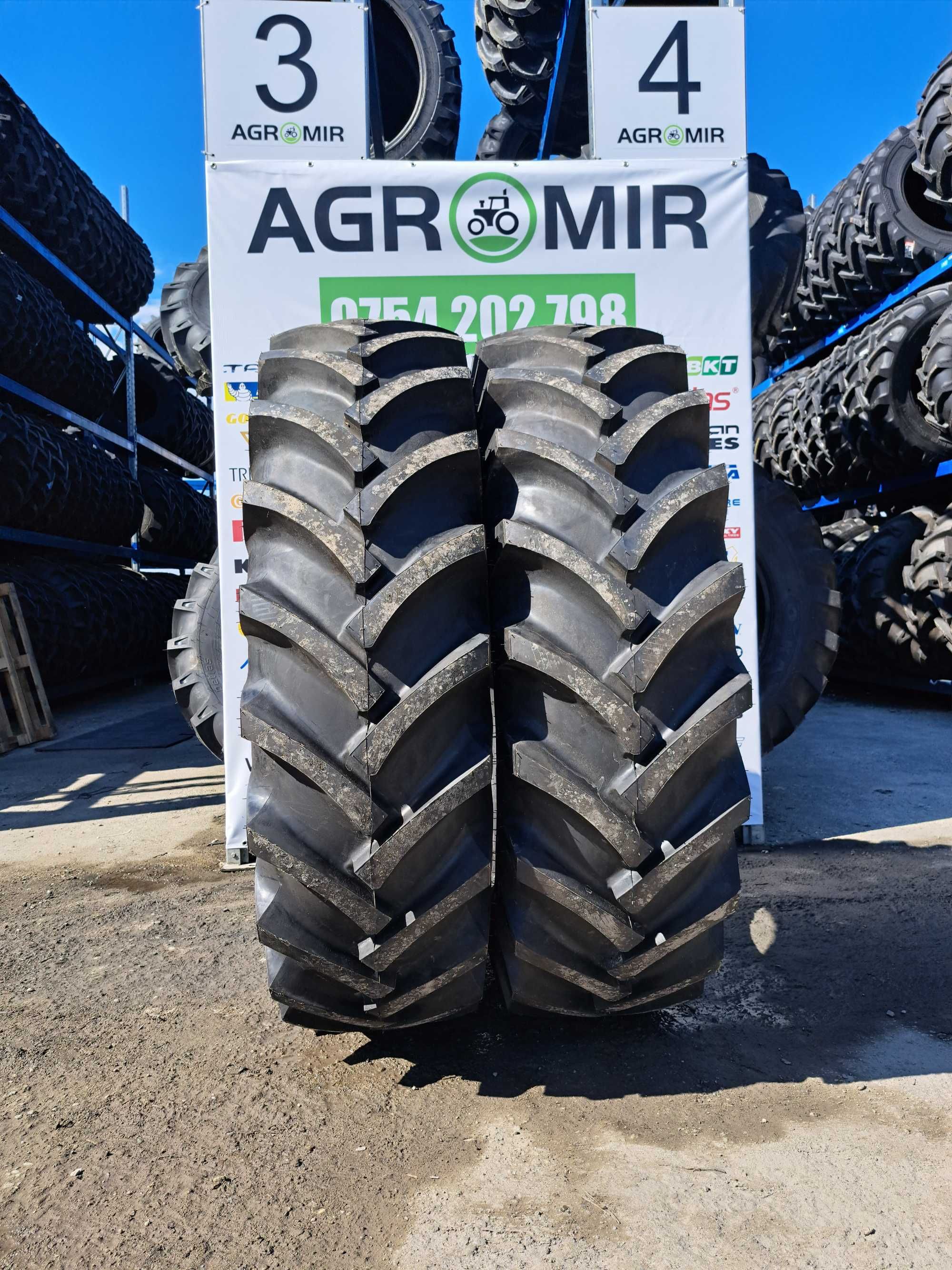 Cauciucuri noi 18.4-38 cu 10 pliuri pentru tractor spate marca OZKA